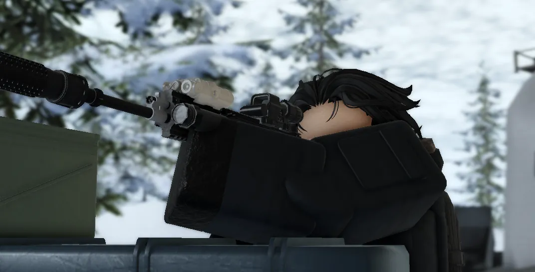 A player braced behind an ammo crate, scoped rifle aimed across the Canadian snow
